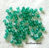 50 Stück - 4 mm Glasschliffperlen - dark emerald AB