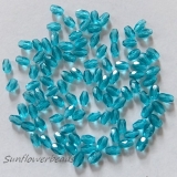 50 Stück - Glasschliffperlen oval - blue zircon