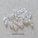 50 Stück - Glasschliffperlen oval - crystal AB