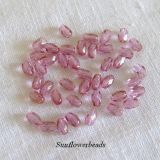 50 Stück - Glasschliffperlen oval - crystal lt. pink lüster