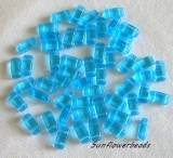 50 Stück - 2 hole prism beads - aquamarine