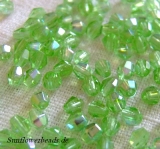 50 Stück - 4 mm Glasschliff Sun Shapes - light peridot AB