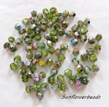 100 Stück - 4 mm Glasschliffperlen - olivine vitrail