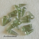 10 Stück - Spike beads - tr. smoked peridot