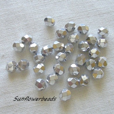 25 Stück - 6 mm Glasschliffperlen - crystal full silver