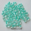 10 Gramm - Twinbeads - crystal mit Farbeinzug hellgrün